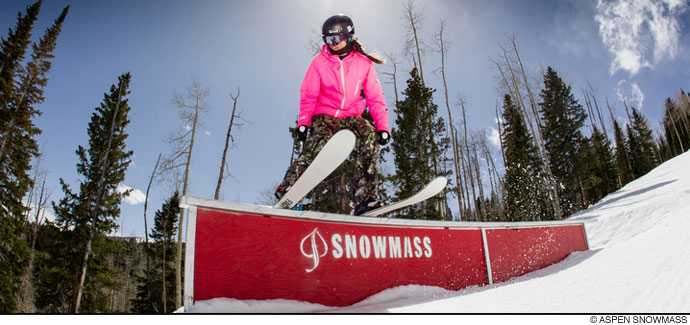 A Woman in a Pink Color Jacket, Skiing